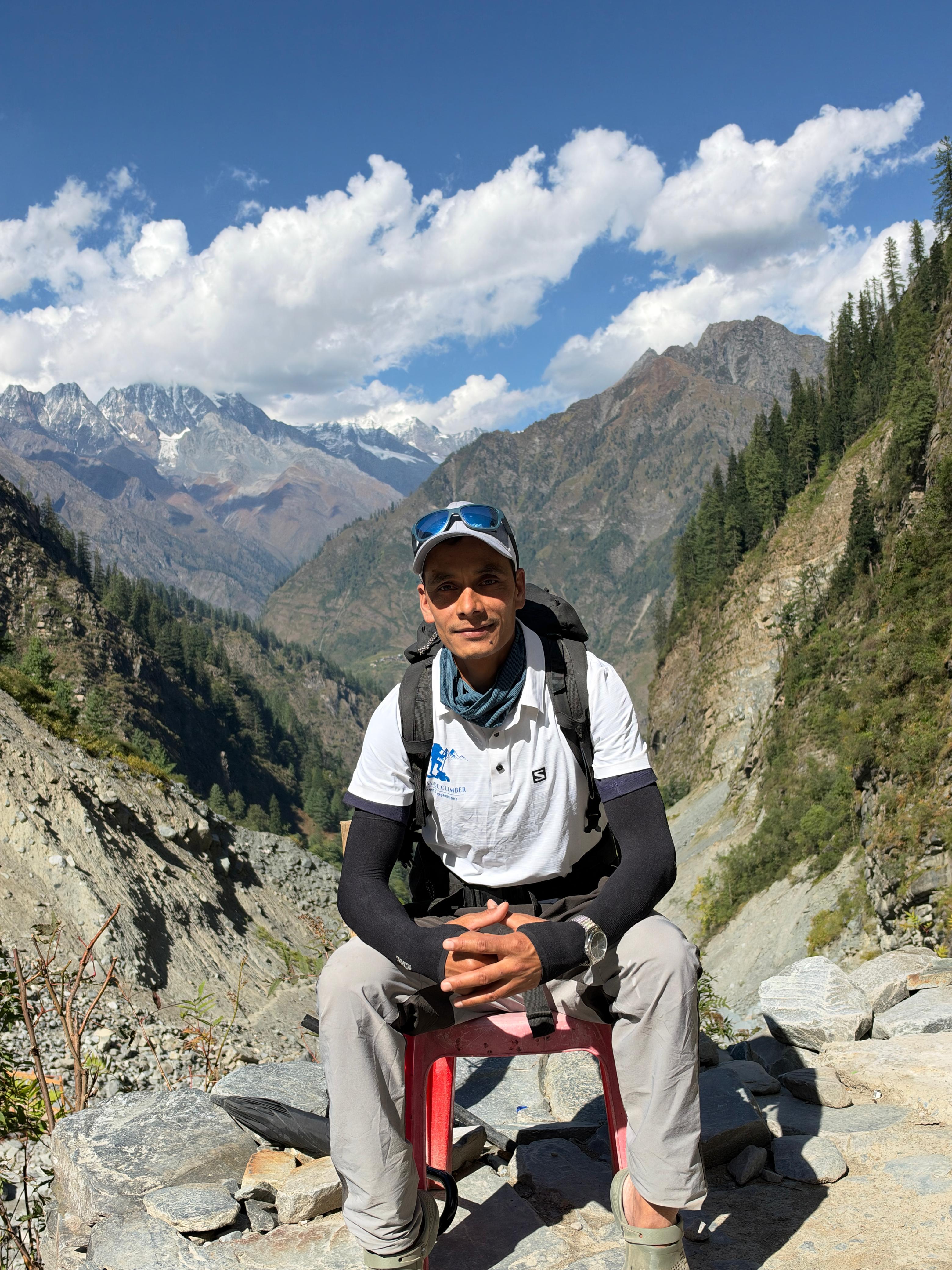 Our certified head guide standing on a rocky Himalayan trail