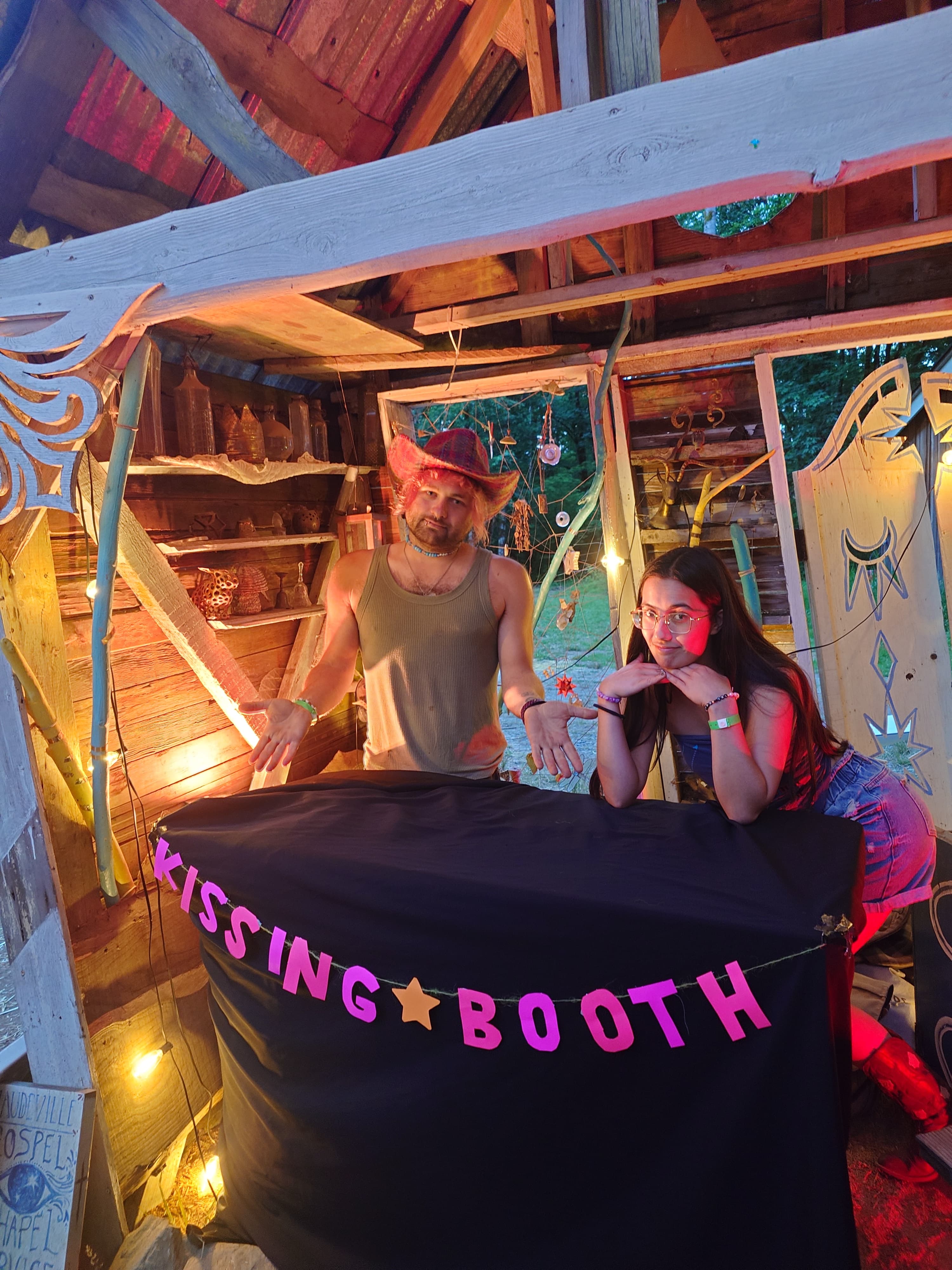 Michelle & I in the kissing booth we made at camp